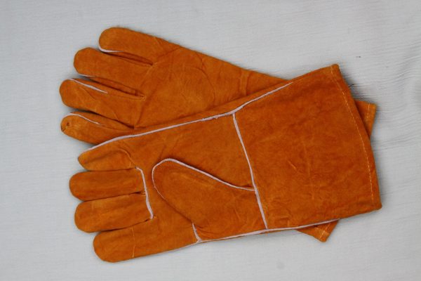 Pair of sued firegloves on blank background